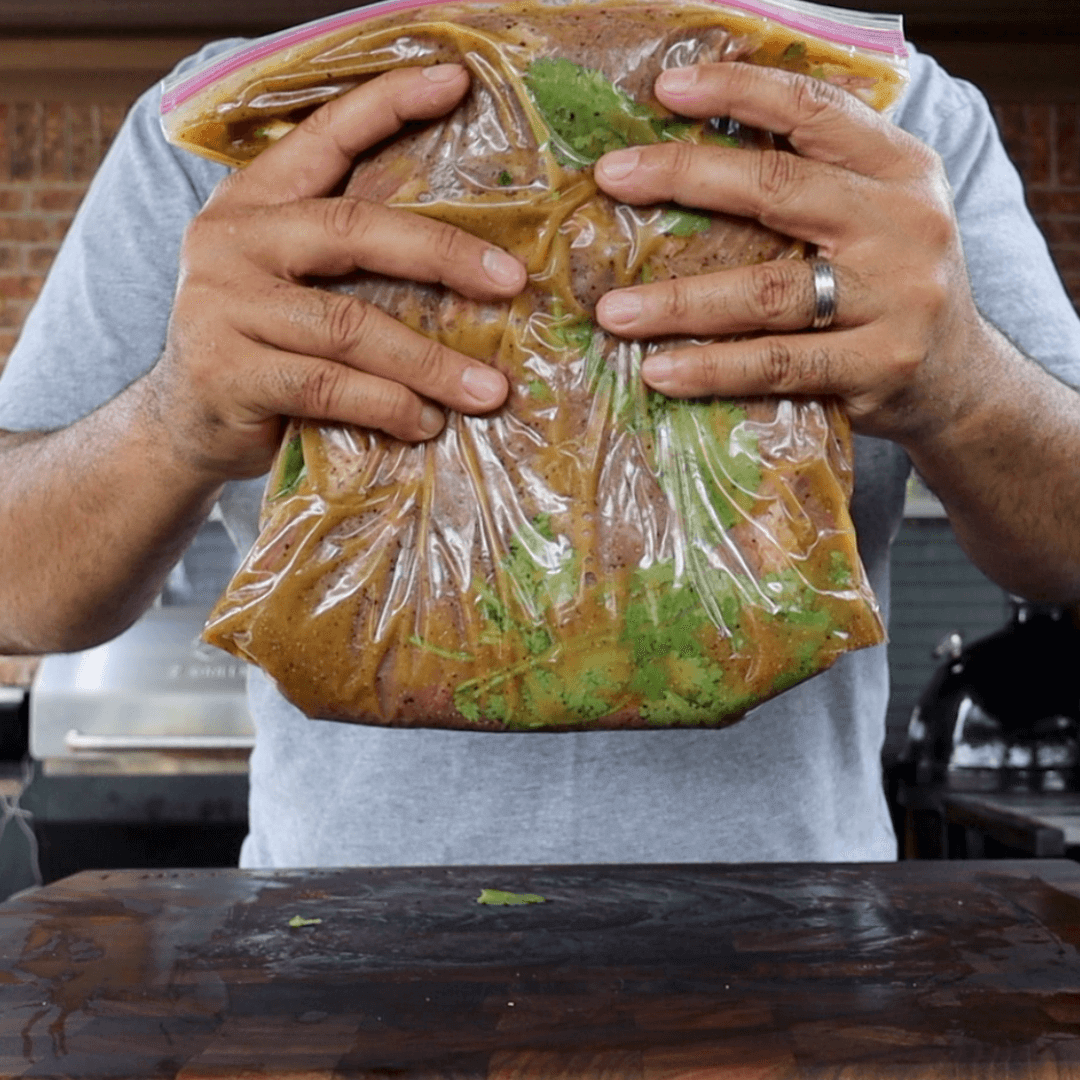Mixing tacos marinate